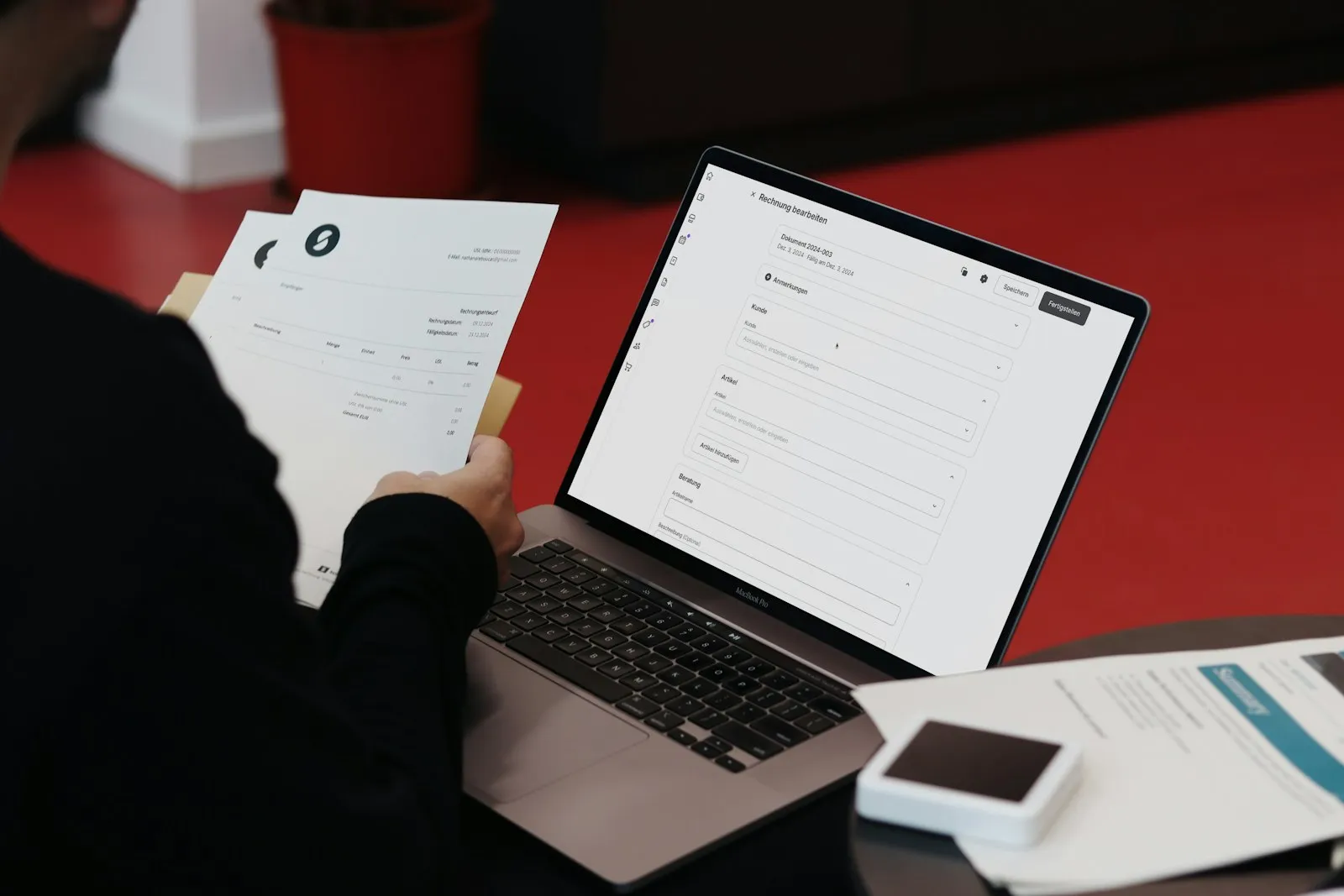 Paying bills online on a laptop